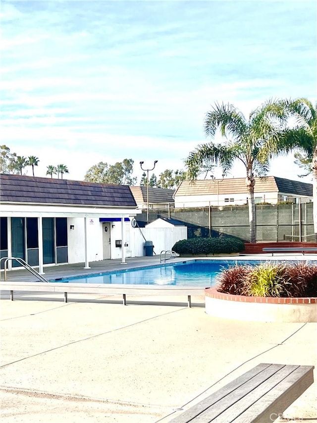 view of swimming pool featuring a patio