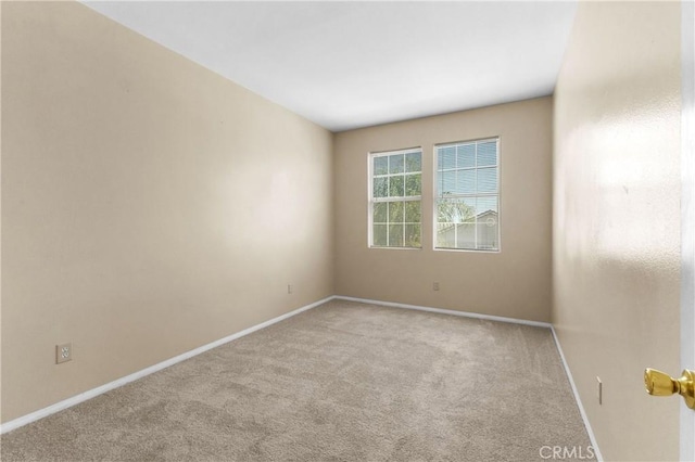 view of carpeted spare room