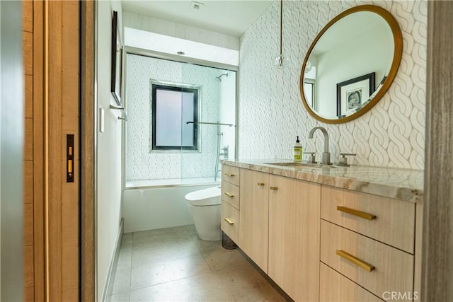 bathroom featuring visible vents, toilet, shower / washtub combination, and vanity