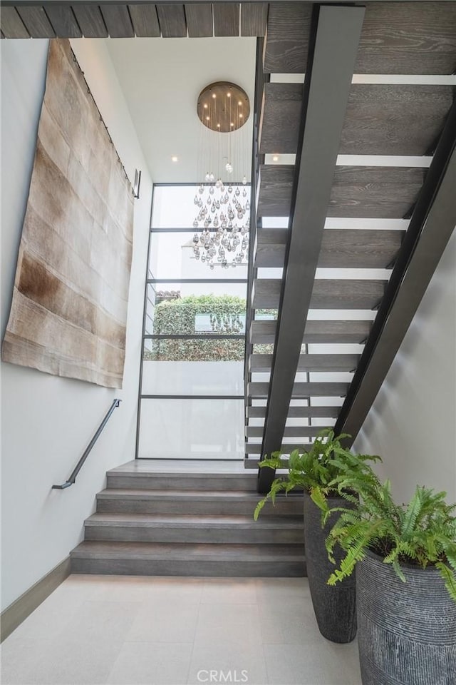 staircase with tile patterned flooring