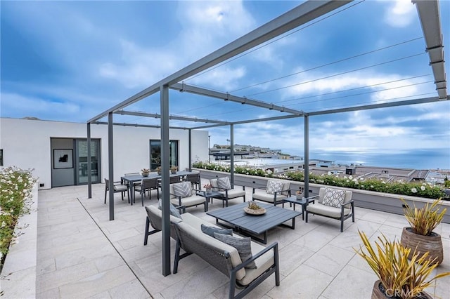 view of patio with an outdoor living space and outdoor dining area