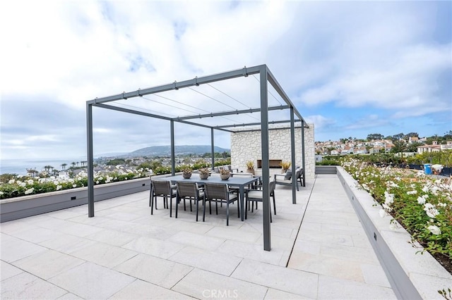 view of patio with a mountain view