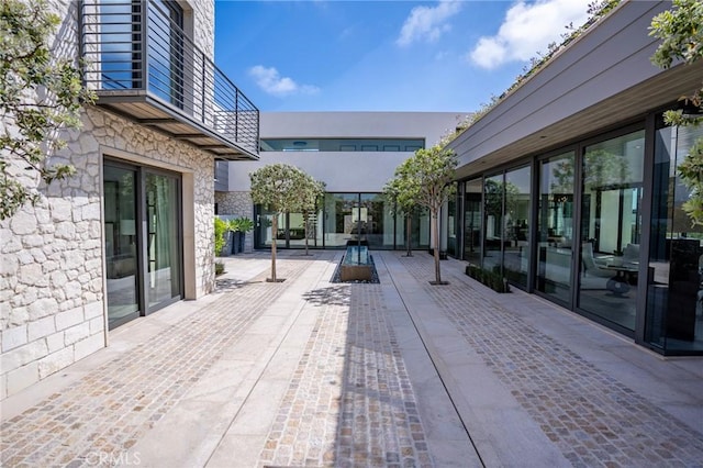 view of patio / terrace with a balcony