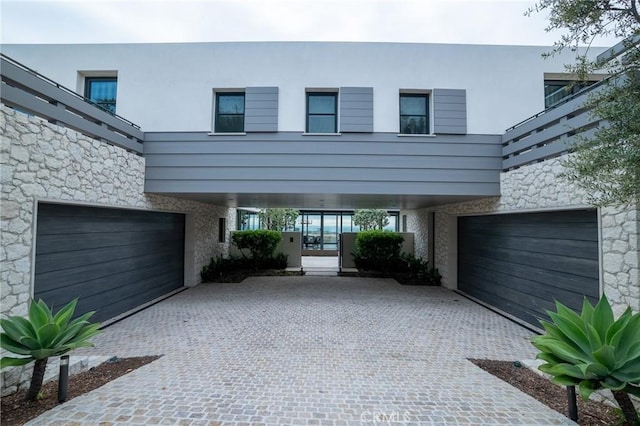 view of front of property with a garage