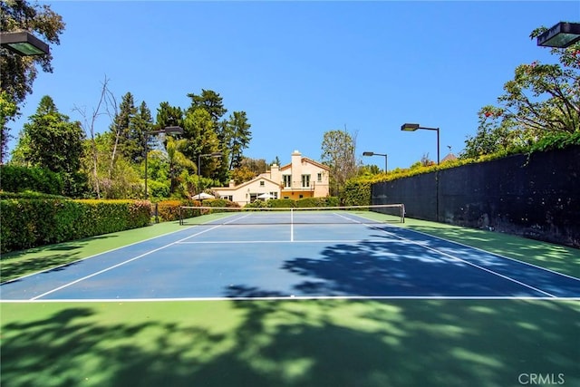 view of tennis court with basketball court