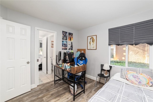 bedroom featuring wood-type flooring