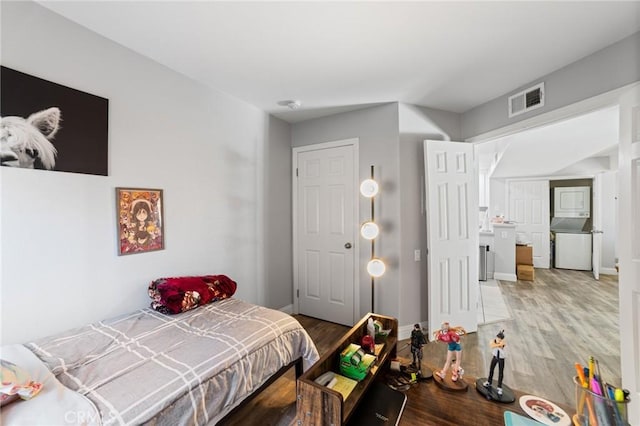 bedroom featuring wood-type flooring