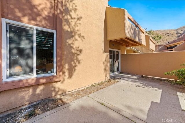 view of home's exterior featuring a patio