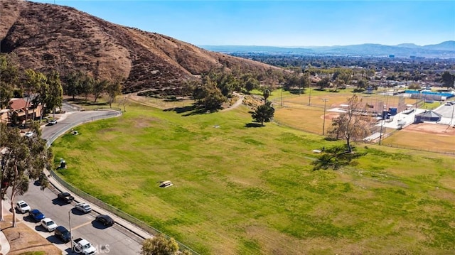 drone / aerial view featuring a mountain view