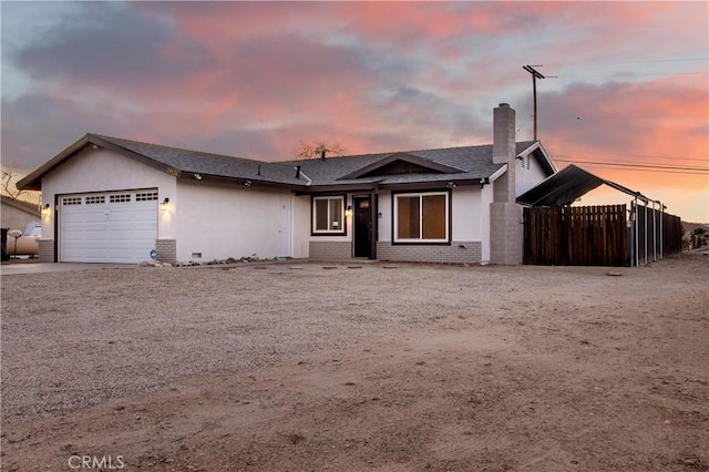 ranch-style house with a garage