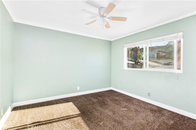 spare room featuring carpet floors and ceiling fan