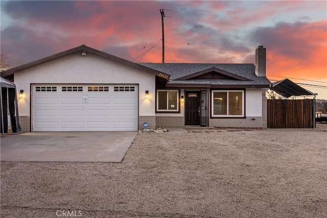 view of front of property featuring a garage