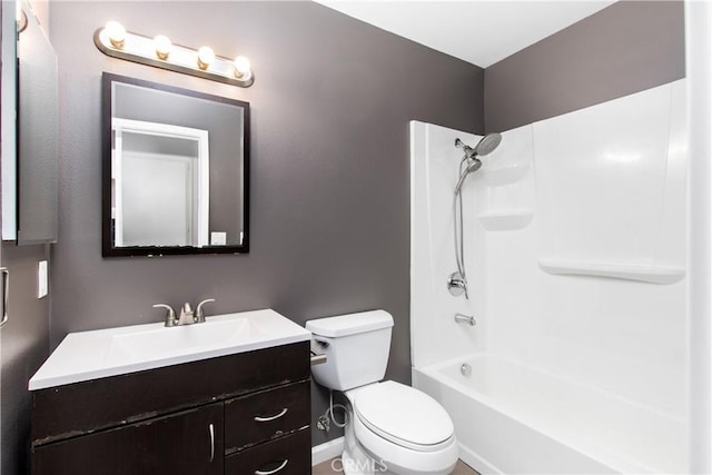 full bathroom with shower / tub combination, vanity, and toilet