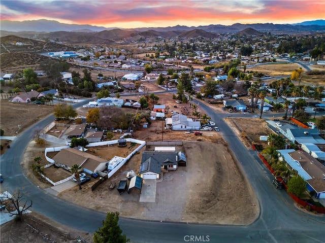 aerial view at dusk with a mountain view