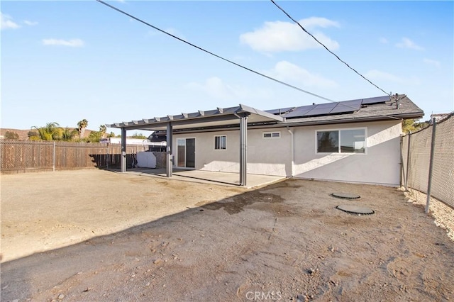 rear view of property with a patio area