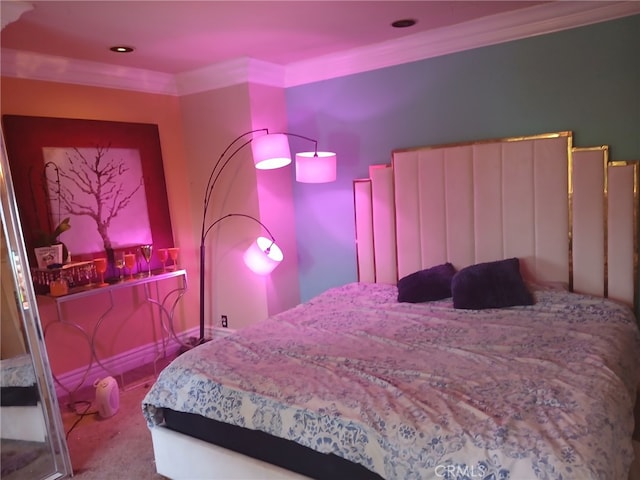 carpeted bedroom featuring crown molding