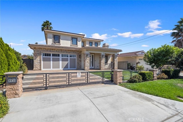 view of front of home featuring a garage and a front lawn