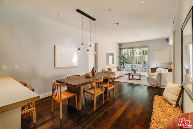 dining room featuring dark hardwood / wood-style flooring