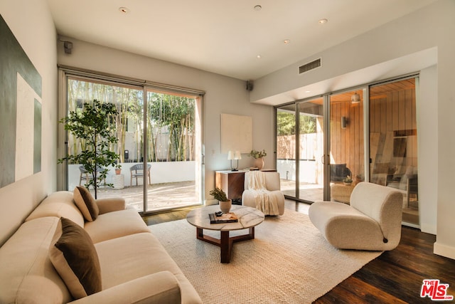 living room with dark wood-type flooring