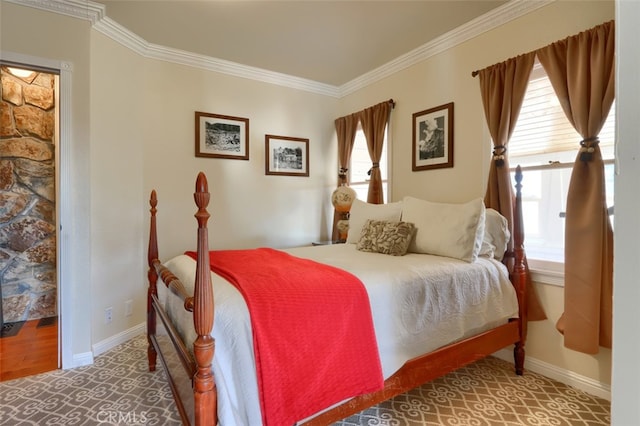 carpeted bedroom with crown molding