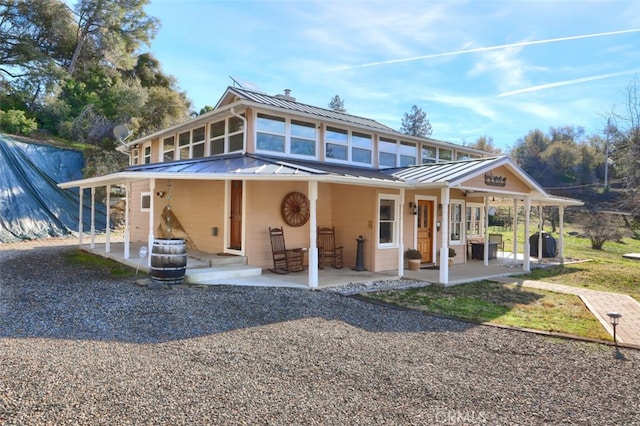 view of front of property with a patio area