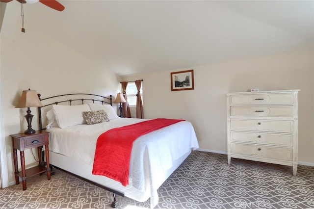 bedroom featuring ceiling fan and vaulted ceiling