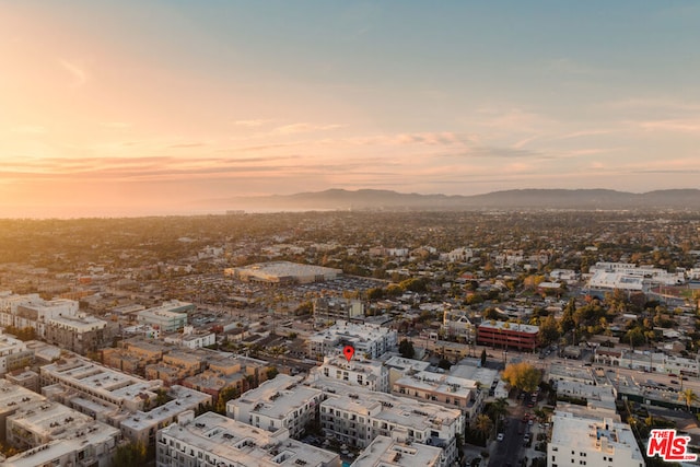 aerial view at dusk with a mountain view