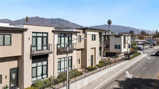 exterior space featuring a mountain view