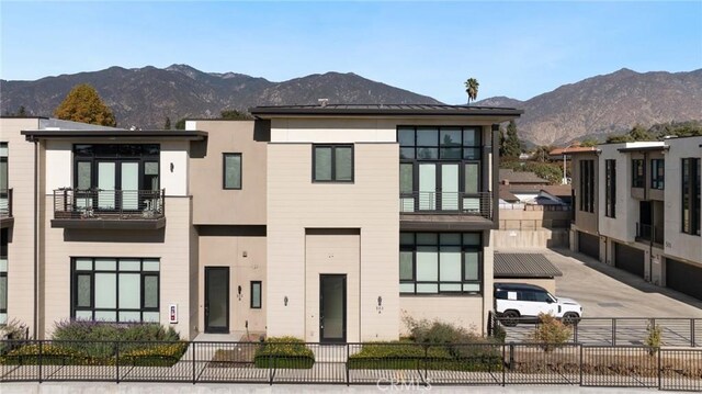 view of front of home featuring a mountain view