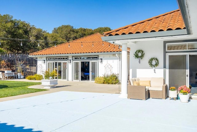 rear view of house with a patio area