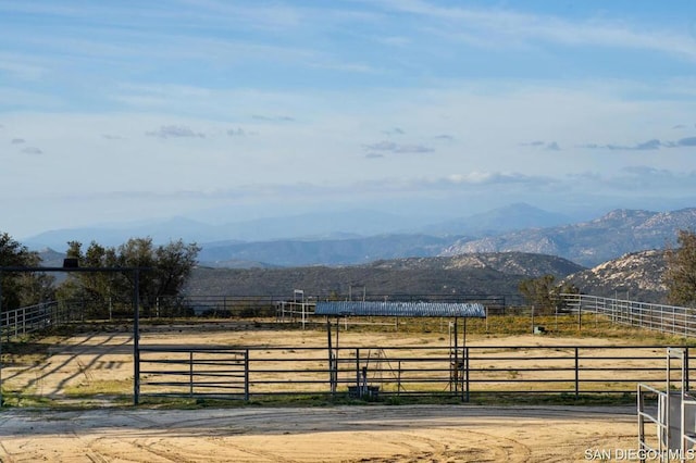 view of mountain feature with a rural view