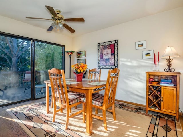 dining space featuring ceiling fan