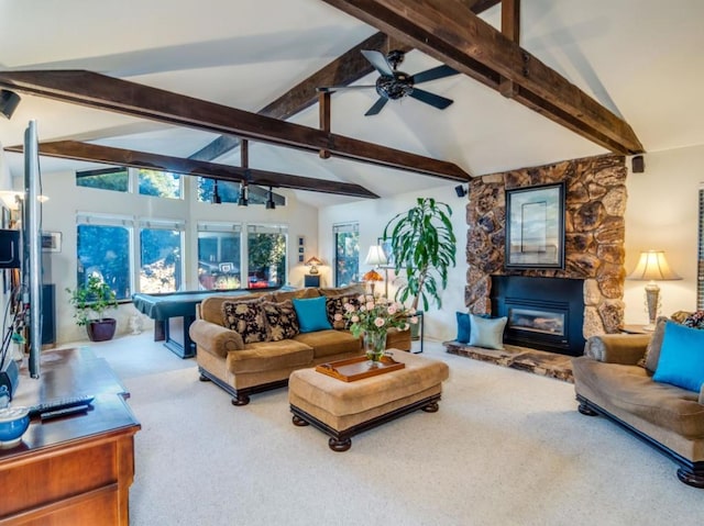 living room featuring a fireplace, carpet floors, and lofted ceiling with beams