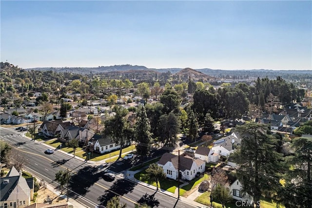 drone / aerial view featuring a mountain view