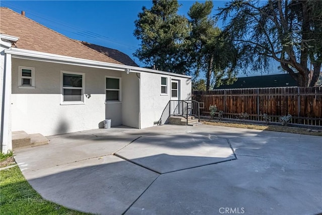 rear view of house with a patio area