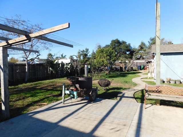 view of patio / terrace with a fire pit