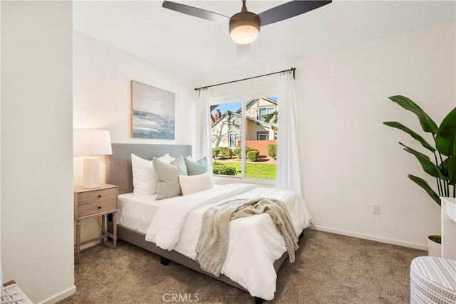 bedroom with ceiling fan and carpet flooring