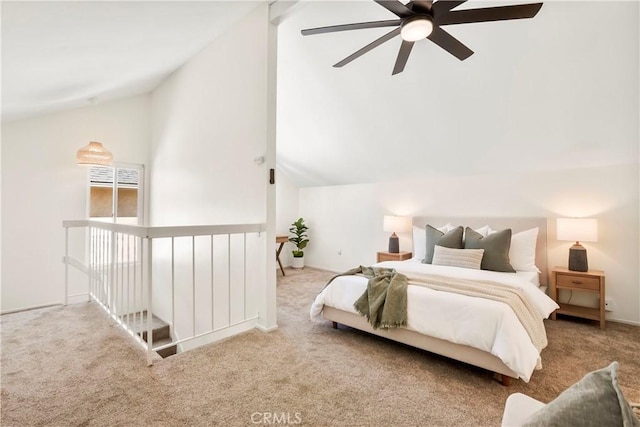 carpeted bedroom featuring ceiling fan and lofted ceiling