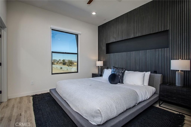 bedroom featuring light hardwood / wood-style floors