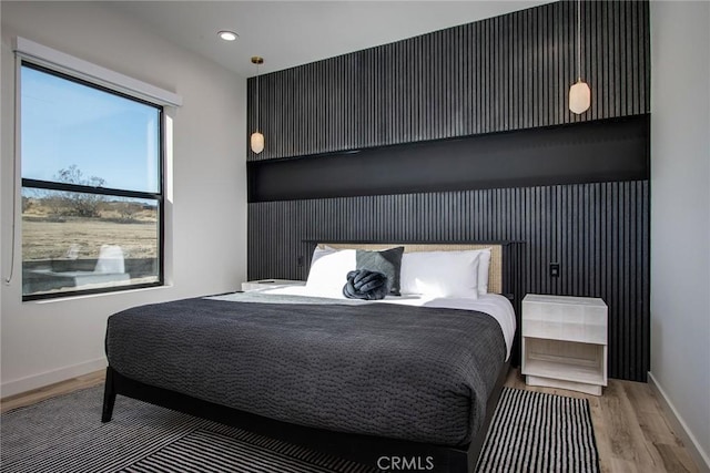 bedroom featuring hardwood / wood-style floors