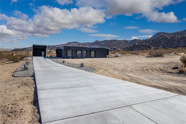 view of front facade featuring a mountain view