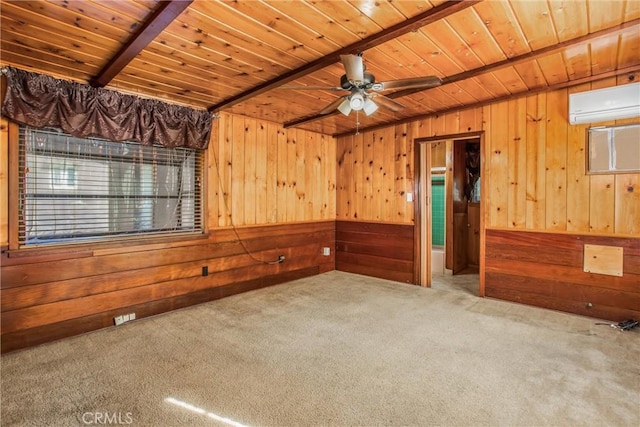 carpeted spare room with wood ceiling, a wall unit AC, ceiling fan, wooden walls, and beamed ceiling