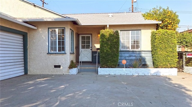 entrance to property with a garage