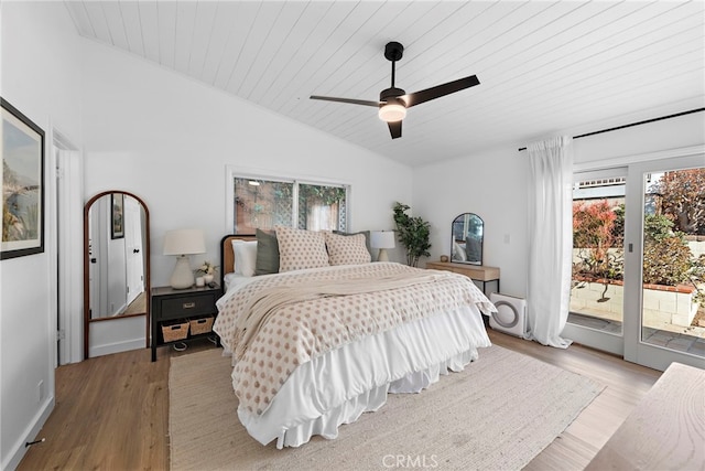 bedroom featuring access to exterior, ceiling fan, light hardwood / wood-style flooring, multiple windows, and wooden ceiling