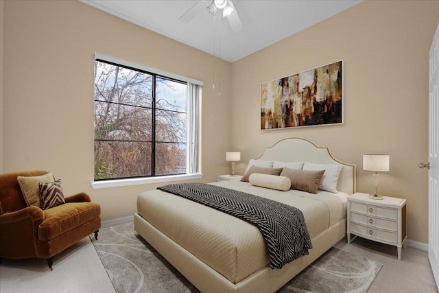 carpeted bedroom featuring ceiling fan