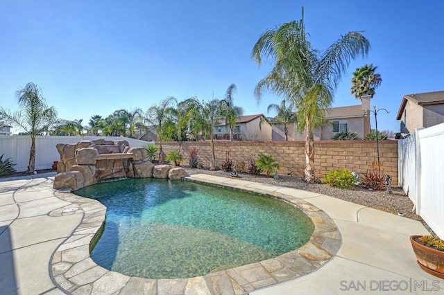 view of pool featuring pool water feature