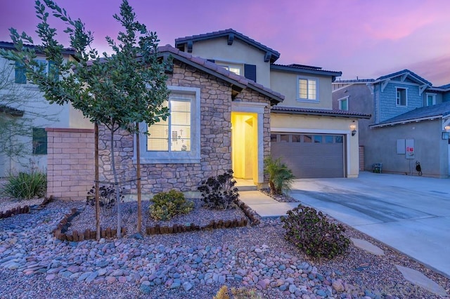 view of front of property featuring a garage