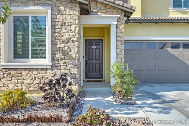 entrance to property with a garage