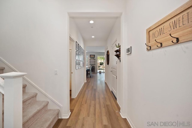 corridor featuring light hardwood / wood-style flooring