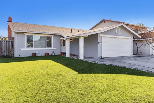 ranch-style home with a garage and a front lawn